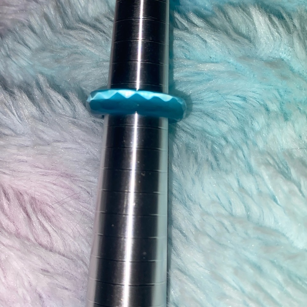 Teal carved ring